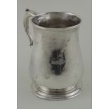 George II silver tankard - has an attractive family coat of arms on the front, small repair to