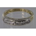 18ct channel set diamond seven stone ring, approx. 0.50ct, size K, weight 2.8g