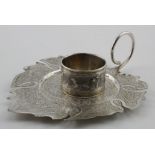 Two Indian/Burmese items of silver comprising a napkin ring which bears rubbed marks and an unmarked