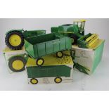 John Deere. Three John Deere boxed diecast models by ERTL, circa 1960s, comprising combine