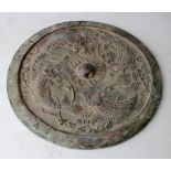 Ancient Chinese Tang Dynasty (AD 618-907) bronze mirror with sea mosnters 180mm