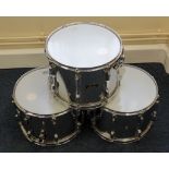 Three Pearl drums, two with Remo Weather King Snare skins, the other with Everplay Extra Parade