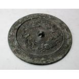 Ancient Chinese Tang Dynasty (AD 618-907) bronze mirror with dragons 185mm