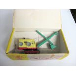 A Dinky Supertoys 975 Ruston Bucyrus Excavator, pale yellow plastic body, red base, green jib and