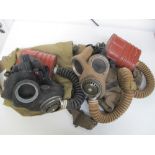 Militaria, two WW2 - British Army respirator gas masks by Avon both with canisters & canvas bags,