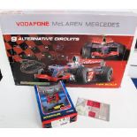 Toys, a boxed Vodafone McLaren Mercedes Micro Scalextric set, sold with Corgi James Bond -