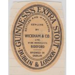 Beer label, Guinness Extra Stout, bottled by Wickham & Co, Bideford, v.o, (top edge stuck to backing