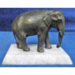 Collectables, Vintage bronze elephant on pale grey marble plinth. Approx 11 cms tall. Small crack