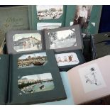 Postcards, a large collection in 14 albums inc. two 20th Century family photo albums and an