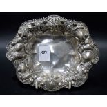 Silver oval bonbon dish, the rim embossed with C scrolls, shells and flowers, stamped STERLING 925