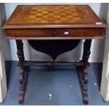 Good Victorian walnut marquetry inlaid games/work table, the hinged top with chequerboard inlay