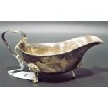 George V silver sauce boat raised on triple feet, London 1918, weight 3.5oz approx.
