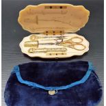 Good late 19th Century French gold sewing set, comprising a thimble, needle case, needle, scissors