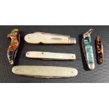 Six various folding pocket knives including one with silver blade and mother of pearl handle.
