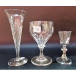 Three 18th/19th Century pedestal drinking glasses to include an ale flute, a cordial glass with