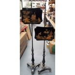 Regency ebony and lacquer pair of pole screens, the shaped lacquer screens with chinoiserie