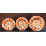 Graduated set of three 19th Century Chinese Imari lobbed plates, the rim decorated with panels of