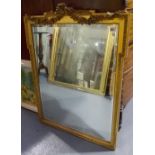 Rectangular bevel edged gilt framed wall mirror applied with foliate garland surmount, height 36in x