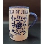 Blue and white tin glazed mug inscribed 'THE GLORIOUS 1ST OF JUNE LORD HOWE 1794' and with portrait,