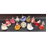 Twelve various small Royal Doulton lady figures