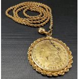 1885 gilded silver one dollar pendant within a gilded frame and necklace.