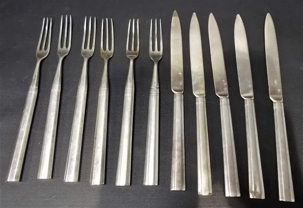 Continental white metal set of six desert forks and five knives, weight 245gms approx.