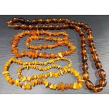 Three amber style bead necklaces.