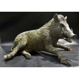 20th Century near life size model of a reclining wild boar, width 37in, height 24in.