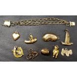 9ct gold charm bracelet with 8 loose 9ct gold charms, weight overall 9.9g approx.