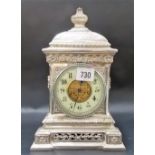 Silver plate on brass timepiece with 3in enamel chaptering dial, the architectural case cast with