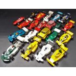 Collection of playworn Scalextric racing cars.