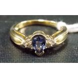 9ct gold tanzanite and diamond chip set ring, weight 4g approx.