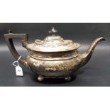 George V silver oval section teapot raised on four ball feet, maker C B & S, Sheffield 1918,