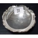 925 silver circular pin dish with C scroll cast rim with triple outswept feet, stamped 925, weight
