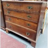 George III oak chest of four long graduated cock beaded drawers raised on bracket feet, width 38in.