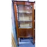 Edwardian inlaid serpentine front display cabinet with two fixed shelves and on square tapering legs
