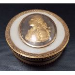 Antique ivory gilt metal mounted circular box with gilded profile picture of a gentleman, modeller's