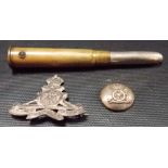 WWI silver Royal Artillery badge, Birmingham 1916; together with a silver Royal Artillery button and