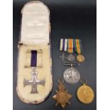 WWI medal group including the Military Cross within Moroccan gilt tooled leather fitted case awarded
