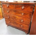 Victorian mahogany chest of two short over three long drawers over a shaped apron and bun feet,