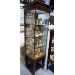 Early 20th Century floor standing shop display tower cabinet by Paris & Sheldon Ltd, Birmingham, the