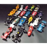 Collection of playworn Scalextric racing cars.