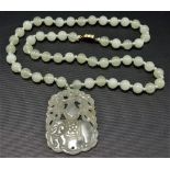 Pale celadon jade pendant and bead necklace with silver gilt clasp.