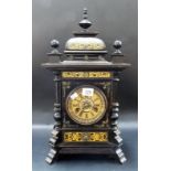Ebonised and painted two-train mantel clock with 4in brass painted dial with Roman numerals,