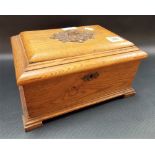 Victorian style oak rectangular hinge lidded box with bronze foliate scroll embossed panel applied