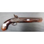 An antique percussion cap pistol with 9in octagonal barrel, the lock plate signed W. Egan, touch