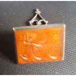 Rare 18th Century Islamic white metal rectangular section seal, the carnelian matrix cut with