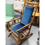 American walnut rocker with upholstered back and seat