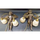 Pair of late 20th Century bronze twin branch wall lights in the form of cherubs holding two glass