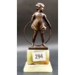 Art Deco bronze figure of a girl with hoop after Ferdinand Preiss, upon green onyx base, height 6.